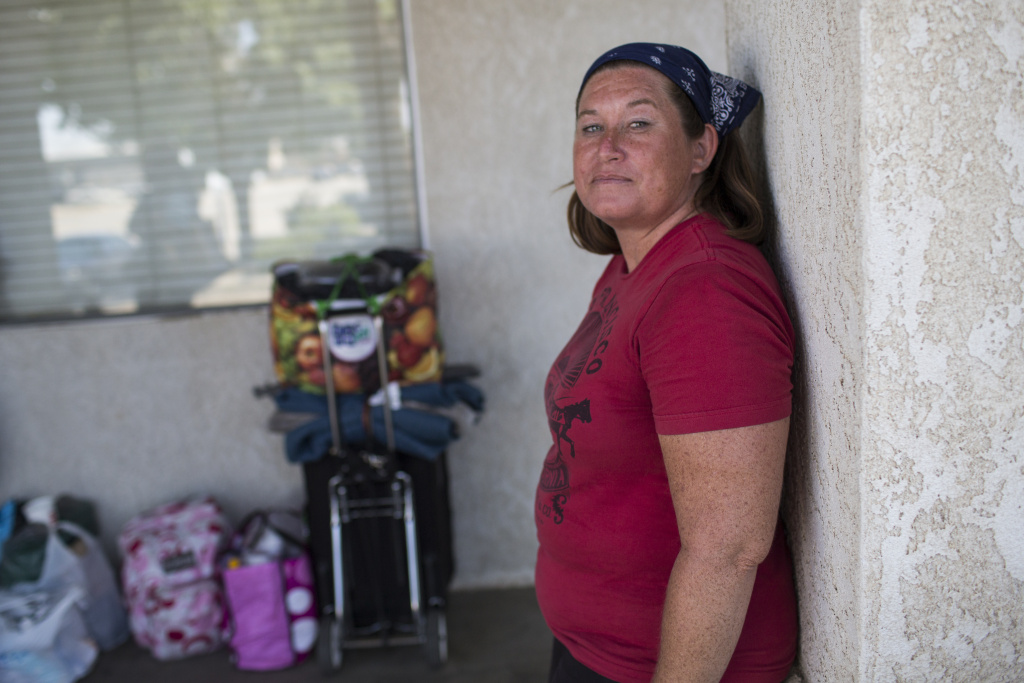 Lancaster Homelessness - 1 Victoria Burton, 44, has been homeless in the Antelope Valley since October. Burton waits in line for shelter on Tuesday afternoon, May 31, 2016 at Grace Resource Center's Lancaster Community Homeless Shelter.