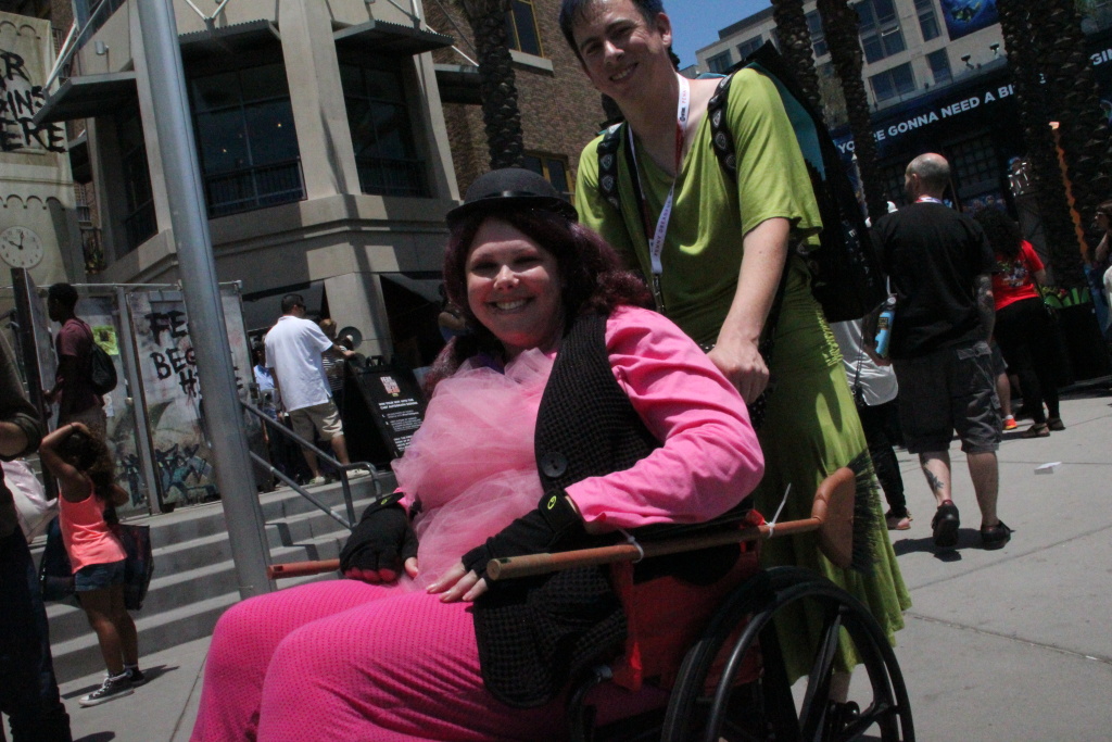Cosplayers Carly Shadrick and Bryan Suarez attend Comic-Con 2015 as Bing Bong and Joy from Pixar's