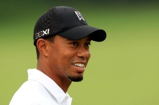 Mercer 19988 Tiger Woods smiles prior to the World Golf Championships-Bridgestone Invitational at Firestone Country Club in Akron, Ohio.