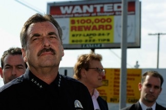 Mercer 19688 Los Angeles Police Department police chief Charlie Beck (L) standing in front of one of 300 billboard showing a 'wanted' poster for two suspects wanted for the beating of a San Francisco Giants fan Bryan Stow speaks during a news conference on May 17, 2011 in Los Angeles, California.