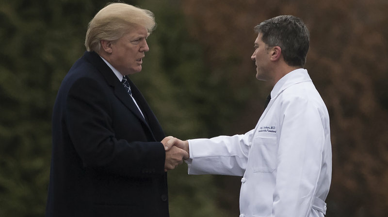 gettyimages-904309370trumpjackson_wide-a146a8432346527b5c3ae251eb9a4ef2b0c878e1-s800-c85.jpg President Trump shakes hands with White House Physician Rear Adm. Dr. Ronny Jackson, following his annual physical at Walter Reed National Military Medical Center in Bethesda, Md., on Jan. 12.