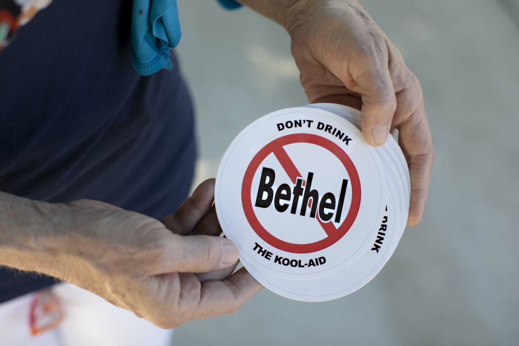 Longtime Redding resident Donna Zibull hands out anti-Bethel stickers on April 29, 2019. Zibull is a member of the Facebook group Investigating Bethel.
Longtime Redding resident Donna Zibull hands out anti-Bethel stickers on April 29, 2019. Zibull is a member of the Facebook group Investigating Bethel.