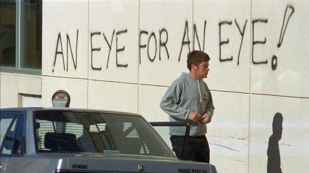 After a 1996 mass killing, Australia tightened its gun laws. Here, graffiti covers the wall of the hospital holding the suspect of the massacre that left 35 people dead.