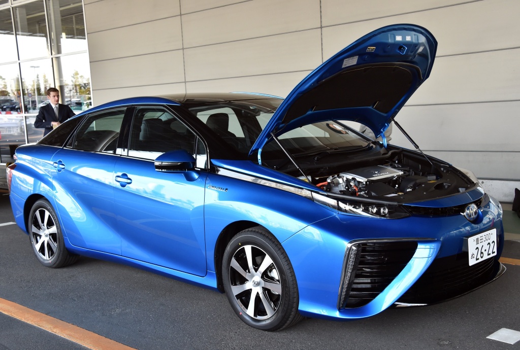 JAPAN-AUTO-TOYOTA-FCV This picture taken on November 17, 2014 shows Japanese auto giant Toyota Motor's fuel cell vehicle 'Mirai', meaning future, in Tokyo. The Mirai, which can drive 650km from a charge of hydrogen, will go on sale in Japan with a price of 62,000 USD (7.2 million yen) on December 15. AFP PHOTO / Yoshikazu TSUNO (Photo credit should read YOSHIKAZU TSUNO/AFP/Getty Images)