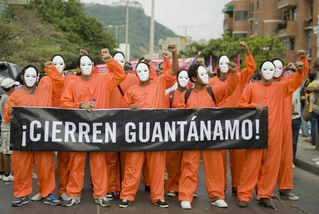 Members of social organizations protest Members of social organizations protest against the VI Summit of the Americas in Cartagena de Indias, Colombia and demand the closing of US prison in Guantanamo on April 14, 2012.