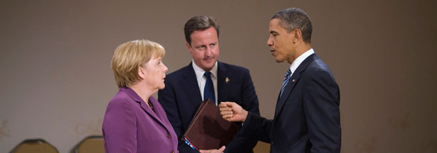 German Chancellor Angela Merkel (L) talks to the British prime minister David Cameron (C) and the US president Barack Obama (R) prior to the outreach meeting at the G8 Summit on June 25, 2010 in Huntsville, Ontario, Canada. Leaders from the world's largest industrial and developing nations are arriving in Canada for the G8 and G20 Summit scheduled to be held June 26 and 27.