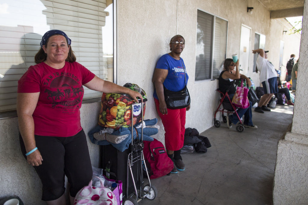 Lancaster Homelessness - 10 Victoria Burton waits in line to get a bed for the night at Grace Resource Center's Lancaster Community Homeless Shelter on Tuesday afternoon, May 31, 2016. Burton, a U.S. Navy veteran, is originally from Australia. She has been homeless once before, for more than a year in Oklahoma.