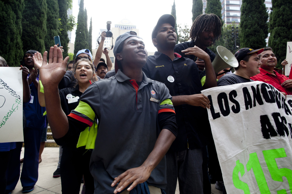 PROTEST 001 Fast food workers went on strike nation-wide to protest for a $15 minimum wage outside of the Central Library in Downtown Los Angeles.