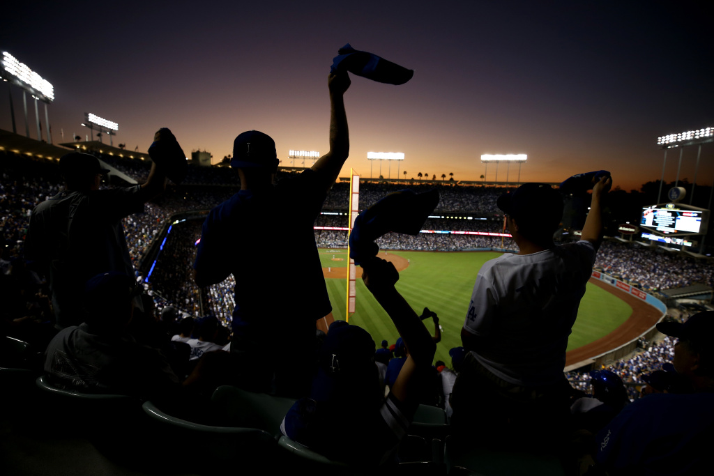 World Series - Houston Astros v Los Angeles Dodgers - Game Two Fans wave towels during game two of the 2017 World Series between the Houston Astros and the Los Angeles Dodgers at Dodger Stadium on Oct. 25, 2017 in Los Angeles, California.