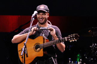 Musician Tom Morello performs onstage during the Rock A Little, Feed Alot benefit concert held at Club Nokia on September 29, 2009 in Los Angeles, California. File photo.