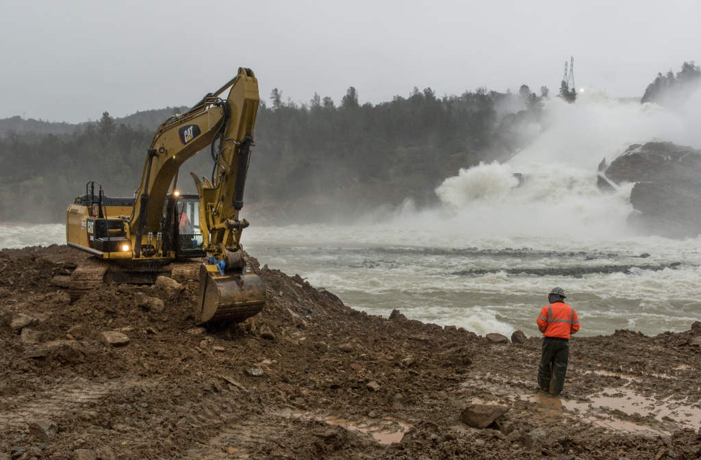 Work Continues To Shore Up The Oroville Dam Work continues along the riverbank across the damaged spillway at Oroville Dam. Workers are shoring up the bank to allow heavy equipment to remove sediment and debris from the diversion pool on February 17, 2017 in Oroville, California