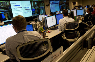 Analyists at the National Cybersecurity & Communications Integration Center prepare for Cyber Storm III during a media session at their headquarters in Arlington, VA, Sept. 24, 2010. Cyber Storm III is NCCIC's capstone national-level cybersecurity exercise.