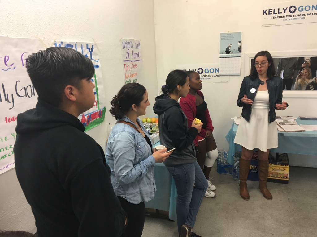 L.A. school board candidate Kelly Gonez, left, addresses campaign volunteers before a day of door-knocking on Sunday, March 5.