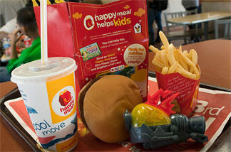 The promise of the latest toy is a big allure for kids at McDonald's