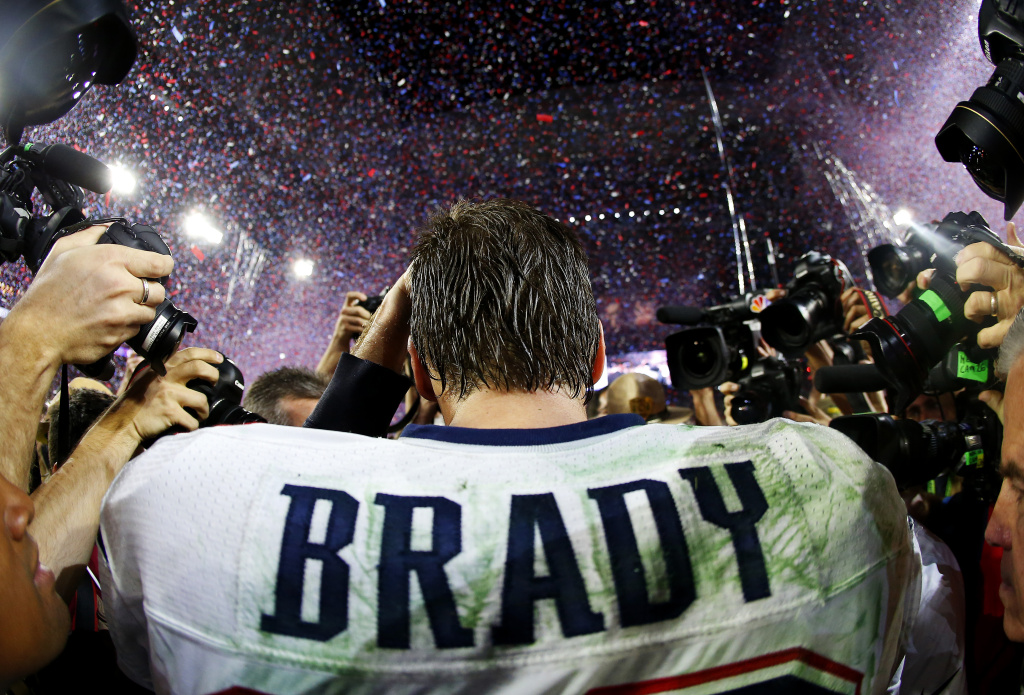 Super Bowl XLIX - New England Patriots v Seattle Seahawks Tom Brady #12 of the New England Patriots is surrounded by the media after defeating the Seattle Seahawks 28-24 during Super Bowl XLIX at University of Phoenix Stadium on February 1, 2015 in Glendale, Arizona.