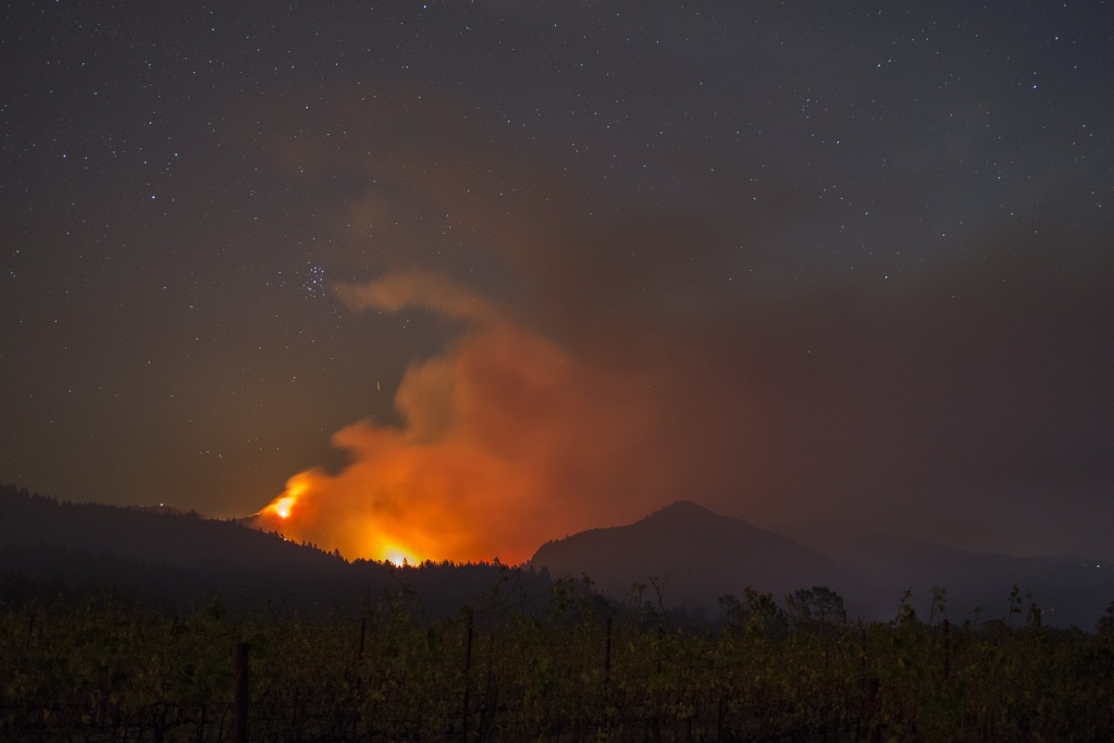 Multiple Wildfires Continue To Ravage Through California Wine Country The Nuns Fire burns through the night on October 14, 2017 near Kenwood and Santa Rosa in Northern California.