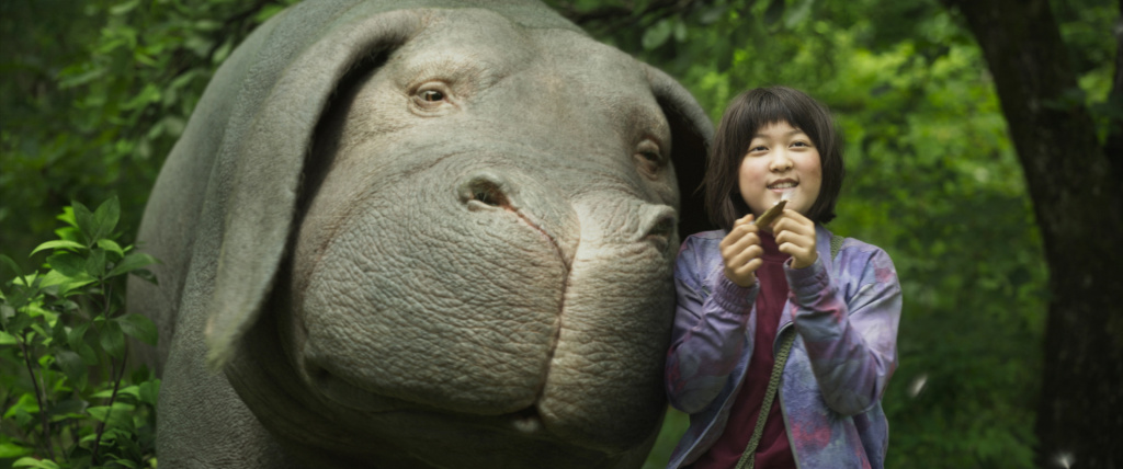 Okja An Seo Hyun with the title character in