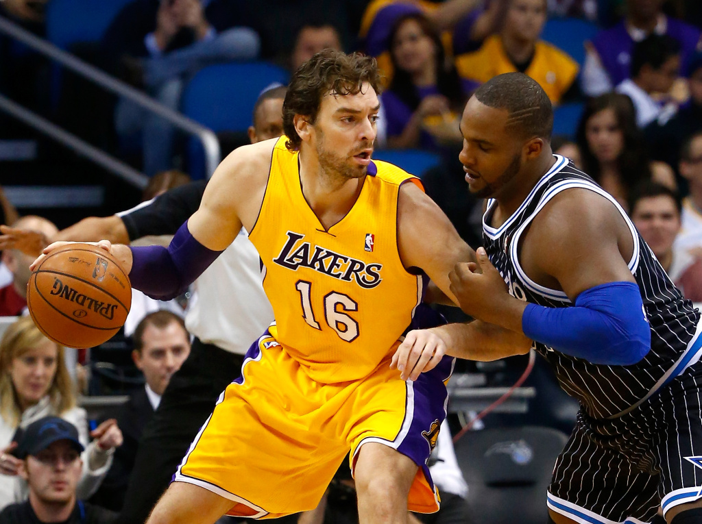 Los Angeles Lakers v Orlando Magic Glen Davis #11 of the Orlando Magic gaurds Pau Gasol #16 of the Los Angeles Lakers during the game at Amway Center on January 24, 2014 in Orlando, Florida.