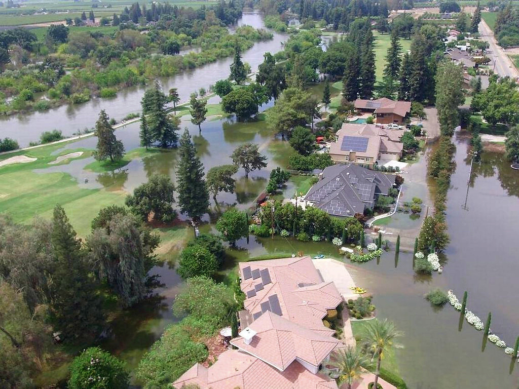 Central California Flooding This June 25, 2017, photo taken by an unmanned aerial vehicle and released by the Tulare County Sheriff's Office shows flooding from the Kings River at the Kings River Golf and Country Club in Kingsburg, Calif. The Kings River began to flood about 25 miles (40 kilometers) north of Fresno as temperatures soared, melting snow in the Sierra Nevada and sending it downstream.