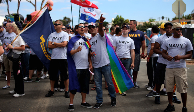 Military personel prepare to march during the San Diego gay pride parade July 16, 2011 in San Diego, California. About 200 active-duty troops and veterans from every branch of the military participated for the first time in the march as the ban on the government policy on homosexuals serving in armed forces, or 'Don't ask Don't Tell', remains in flux in the justice system