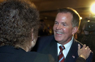 State Sen. Roy Ashburn, R-Bakersfield, receives a hug from Jane Parsons, chairman of the Fresno County Republican Party, during an election-night party held in Fresno Tuesday, Nov. 2, 2004.