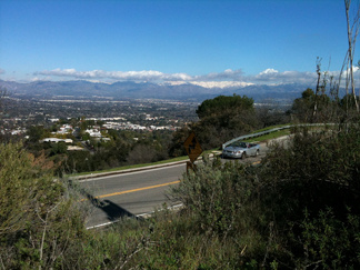 A view from Mulholland Drive at the Stone Canyon Overlook in Beverly Glen on Saturday, Jan. 23, 2010, shows the snowy Angeles National Forest as a backdrop at the edge of the San Fernando Valley.