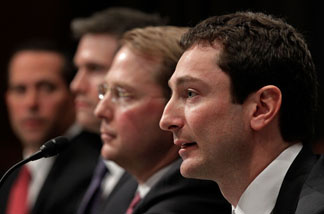 Fabrice Tourre (R), executive director of the structured products group trading for The Goldman Sachs Group, testifies before the Senate Homeland Security and Governmental Affairs Investigations Subcommittee with (L-R) Daniel Sparks, former partner and head of the Mortgages Department at the Goldman Sachs Group, Joshua Birnbaum, former managing director of the structured products group trading for The Goldman Sachs Group and Michael Swenson, managing director of structured products group trading for The Goldman Sachs Group on Capitol Hill on April 27, 2010 in Washington, DC.
