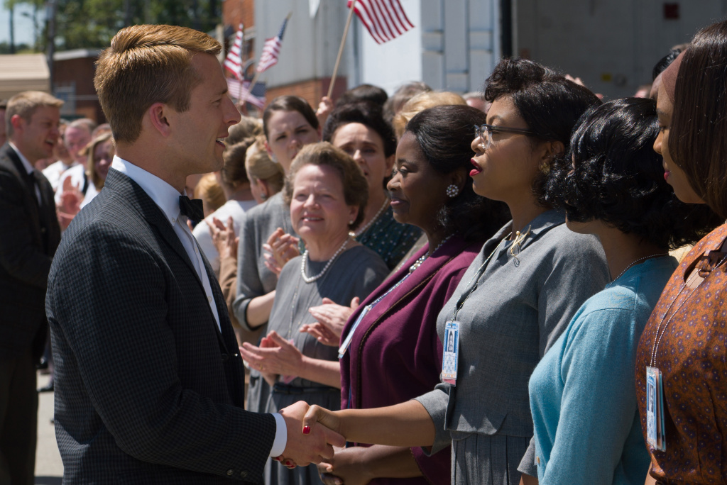 HIDDEN FIGURES Katherine G. Johnson (Taraji P. Henson), flanked by fellow mathematicians Dorothy Vaughan (Octavia Spencer) and Mary Jackson (Janelle Monáe) meet the man they helped send into orbit, John Glenn (Glen Powell), in HIDDEN FIGURES.