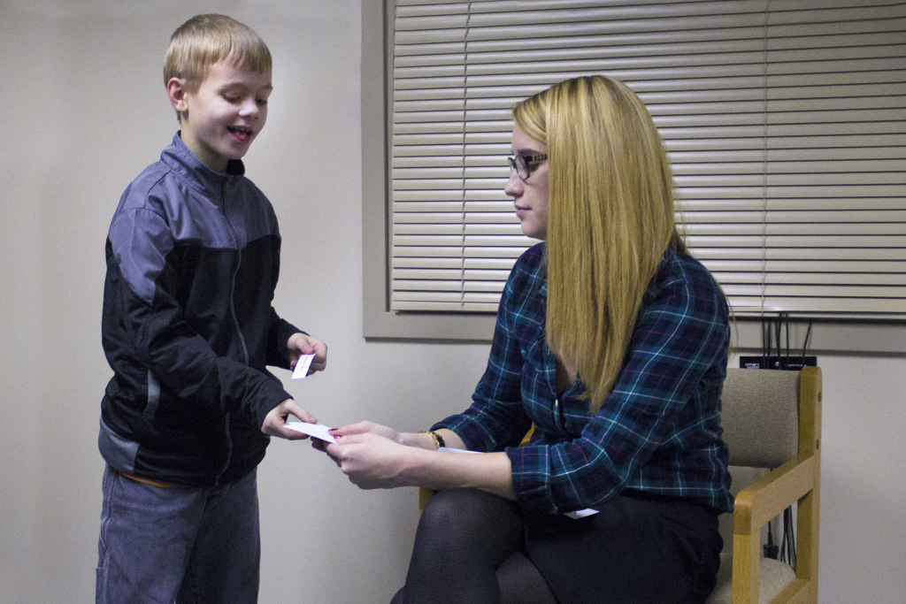 Shaw, 8, plays an improv game with Erin McTiernan, an Indiana State University doctoral student. Shaw is a participant in an improv class at Indiana State University for children with high functioning autism. Shaw, 8, plays an improv game with Erin McTiernan, an Indiana State University doctoral student. Shaw is a participant in an improv class at Indiana State University for children with high functioning autism.