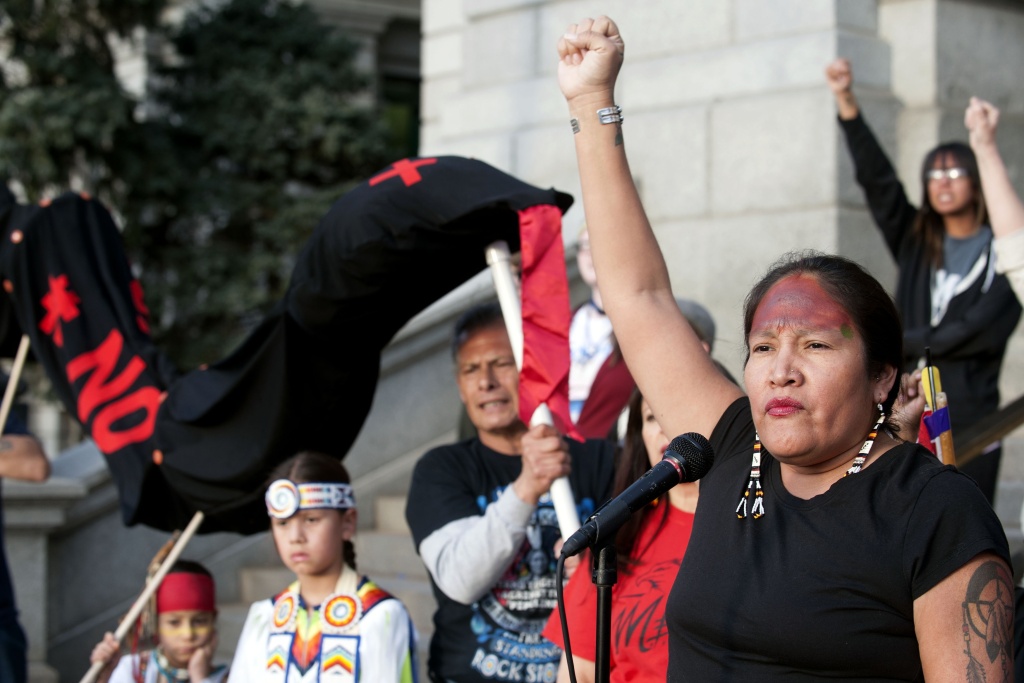 US-POLITICS-PIPELINE-PROTEST Molly Ryan Kills Enemy of the Sicangu Lakota Nation addresses indigenous rights activists gathered at the Colorado State Capital during the Native Nations March in Denver, Colorado on March 10, 2017.