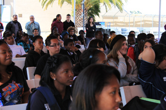 Students gathered in the Amino South Los Angeles Charter High School lunch area to listen to Israeli Consul General Jacob Dayan and Operation Hope founder Cookie Lommel speak on traveling to Israel.