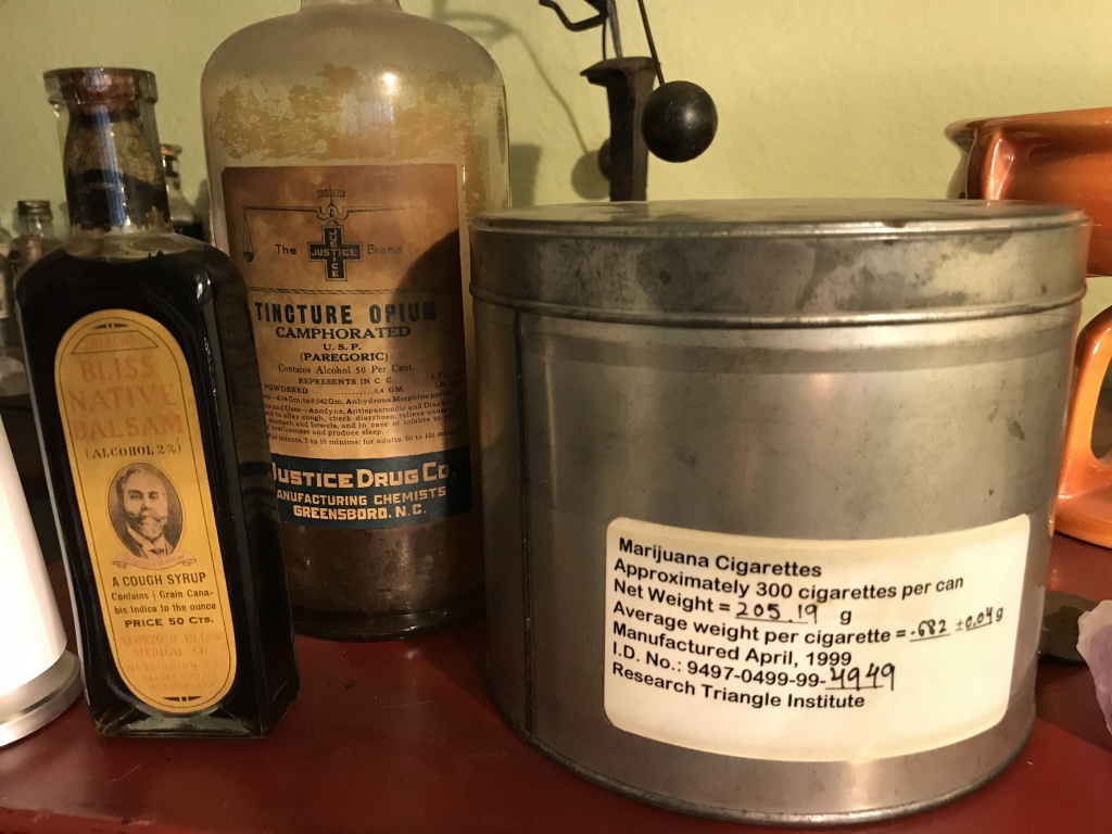 cannabis-based medicines Lonnie Painter collects antique opioid- and cannabis-based tinctures. The large tin is from an experimental federal program that provides marijuana pre-rolls to selected patients around the country.