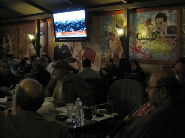Patrons watched Al Jazeera updates from Egypt last night at the Nubia Cafe in Anaheim, February 10, 2011