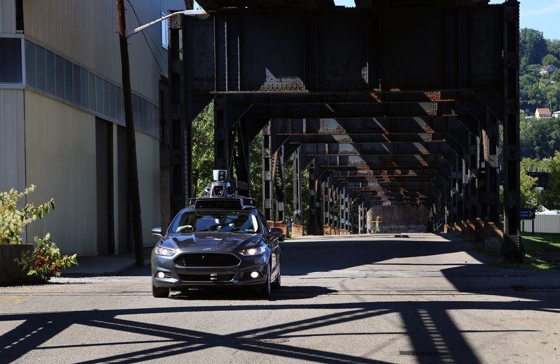 mharris-20160913_2274edit_custom-2c66eaa06351cc51fe98a1456323c118e23b6461-s800-c85.jpg A self-driving car leaves Uber's newest riverside hub in Pittsburgh. Company officials say the Rust Belt city is perfect for beta testing, citing diverse topography, frequent weather maladies, near-constant construction and hundreds of bridges and tunnels.