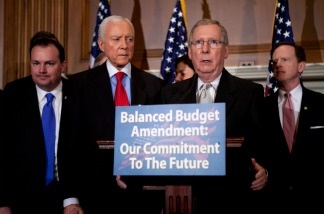 Mercer 16668 Sen. Mike Lee (R-UT), Sen. Orrin Hatch (R-UT), Senate Minority Leader Mitch McConnell (R-KY), Sen. Pat Toomey (R-PA) (L-R), and other Senate Republicans hold a news conference to announce a proposed balanced budget amendment to the Constitution on March 31, 2011.