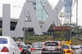 File photo: Traffic backs up at a security checkpoint near the entrance to Los Angeles International Airport on December 26, 2009.