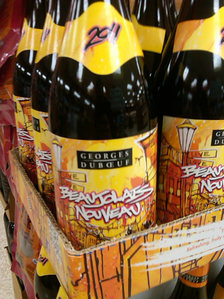 Is has arrived! And this time, the Beaujolais Nouveau gets a rad street art label. Move over, flowers and colorful abstractions! Wine marketing marches on!