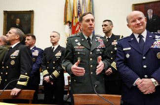 U.S. Army Gen. David Petraeus (C), commander of the U.S. Central Command; Navy Adm. Eric Olson (L), commander of the U.S. Special Operations Command; and Air Force Gen. Duncan McNabb (R), commander of the U.S. Transportation Command, prepare to testify during a hearing on the FY2011 National Defense Authorization Budget Requests before the House Armed Services Committee March 17, 2010 in Washington, DC.