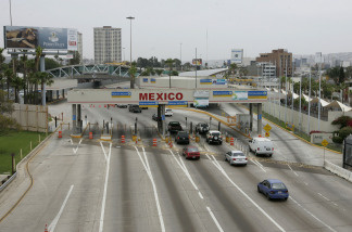 Motorists head into Mexico at the border in San Ysidro, California.