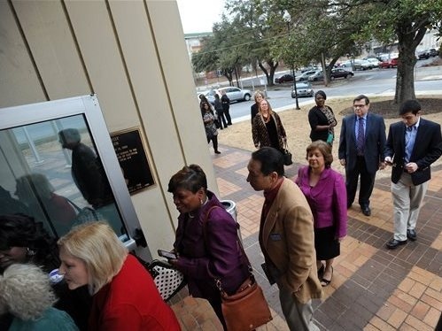 A crowd lines up in Atlanta for a recent women's forum on pay equity and other issues featuring Rep. John Lewis, D-Ga., and House Democratic Leader Nancy Pelosi of California.