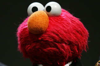 It ain't easy savin' green. Mitt Romney sees a future that includes advertisements on 'Sesame Street.'