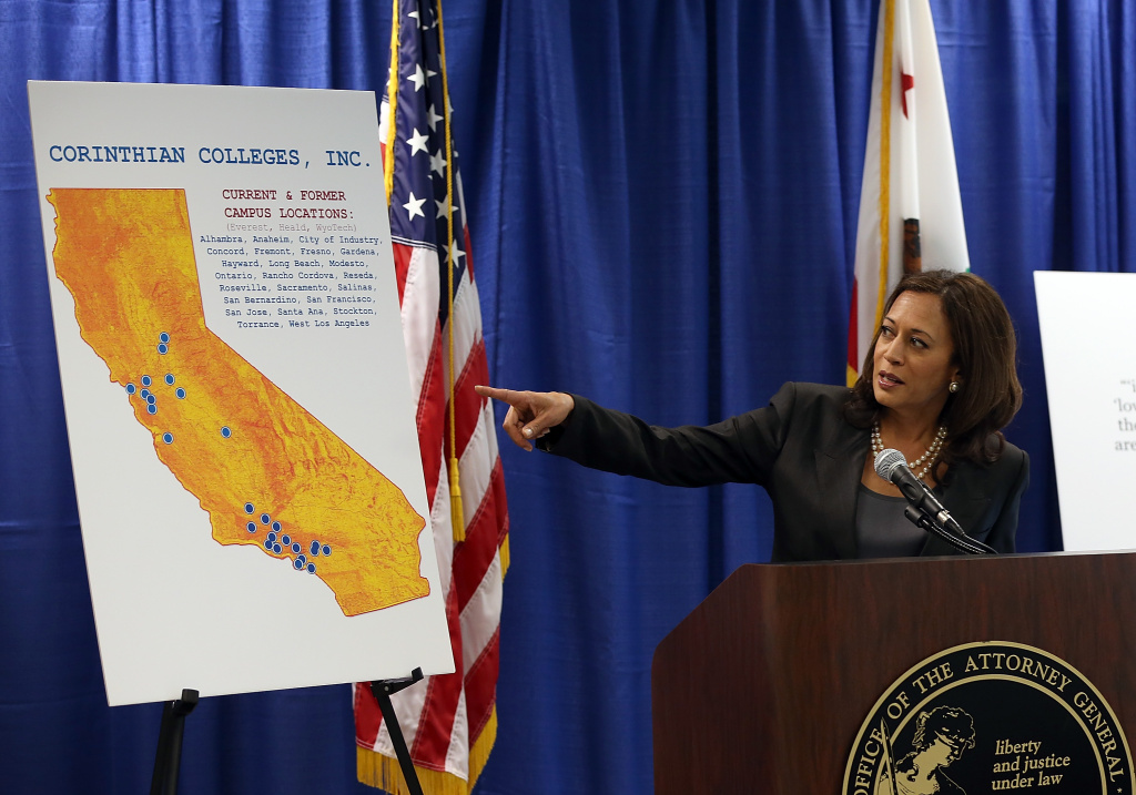 California Attorney General Kamala Harris Announces Lawsuit SAN FRANCISCO, CA - OCTOBER 10: California Attorney General Kamala Harris points to a map as she speaks during a news conference on October 10, 2013 in San Francisco, California. Harris announced the filing of a lawsuit against the for-profit Corinthian Colleges and its subsidiaries for alleged false advertising, securities fraud, intentional misrepresentations to students and the unlawful use of military insignias in advertisements. Santa Ana, California-based Corinthian Colleges operates 111 total campuses in North America with 24 Heald, Everest and WyoTech colleges in California that have an estimated 27,000 students. (Photo by Justin Sullivan/Getty Images)