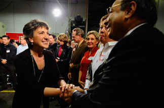 Republican candidate for U.S. Senate Carly Fiorina greets supporter Dr. Reza Karkia (R) during a town hall meeting Aranda Tools Inc. during a campaign event on October 6, 2010 in Huntington Beach, California.