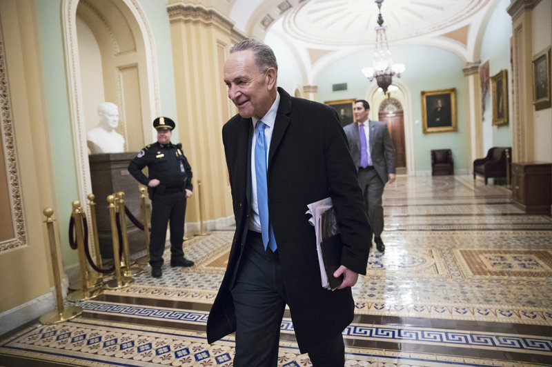 ap_18022509553142-edit_custom-e41f762af570abb96e04b26cced91ae0c2b245f1-s800-c85.jpg Senate Minority Leader Chuck Schumer, D-N.Y., arrives at the Capitol on Monday, the third day of the government shutdown. With support for a 17-day funding measure, the government is on track to reopen.