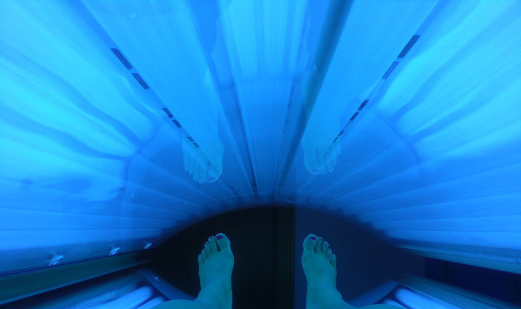 A tanner inside a tanning bed. Starting Jan. 1, 2012, tanning will be illegal for those under 18 in California.