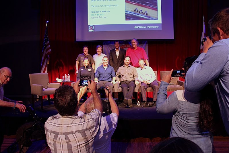 Olympic Day at KPCC Olympic Day Olympians pose for photos at the end of the evening. Top row, from left, David Brinton, Ron Skarin, Giddeon Massie, John Naber. Bottom row, from left, Tamara Christopherson, Sky Christopherson, Adam Laurent and Adam Duvendeck. All are Olympic track cyclists except Naber, an Olympic swimmer, and Tamara Christopherson, an Olympic kayaker.