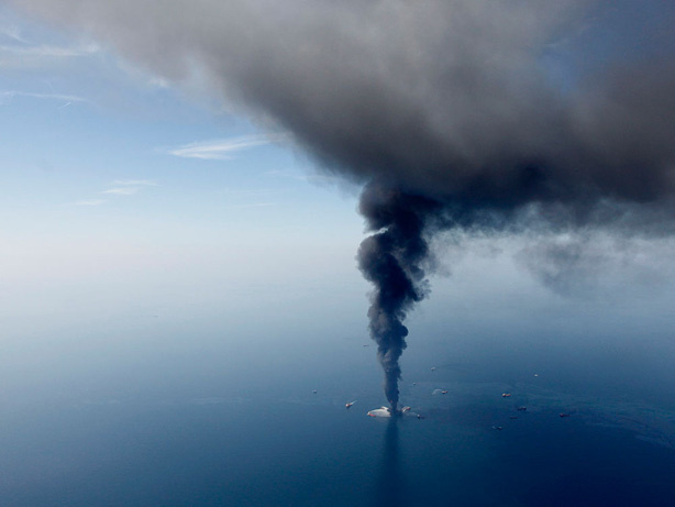 The Deepwater Horizon oil rig is seen burning on April 21 in the Gulf of Mexico. Federal investigators have turned their attention to the cementing process that occurred on the oil rig before the explosion.
