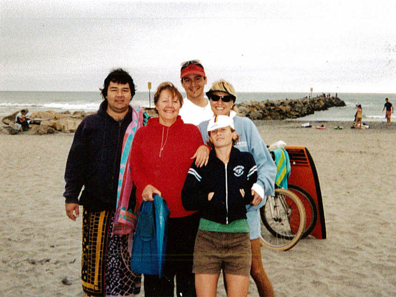 Jail suicides Jason Nishimoto (left) on the beach with his family.