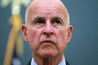 California Attorney General and Democratic candidate for governor Jerry Brown pauses while speaking during a news conference August 31, 2010 in Oakland, California.