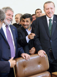 Mercer 7524 Brazilian President Luiz Inacio Lula da Silva, and Turkish Prime Minister Recep Tayyip Erdogan (R) smile as Iranian President Mahmoud Ahmadinejad (C) talks to Brazil's Foreign Minister Celso Amorim after Iran inked a nuclear fuel swap deal in Tehran in 2010. Iran's nuclear chief said Wednesday his country has begun installing a new generation of uranium enrichment centrifuges at its main facility making nuclear fuel.